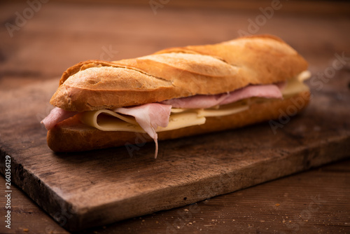 baguette sandwiches on rustic table