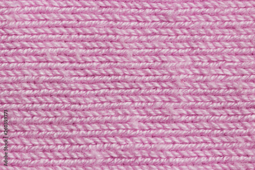 Pink knit background with patterns Pink knit background with patterns