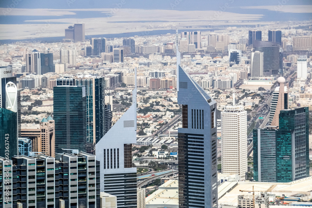 Aerial view of Dubai Skyline, Amazing Rooftop view of Dubai Sheikh Zayed Road Residential and Business Skyscrapers in Downtown Dubai, United Arab Emirates Aerial view of Dubai Skyline, Amazing Rooftop view of Dubai Sheikh Zayed Road Residential and Business Skyscrapers in Downtown Dubai, United Arab Emirates