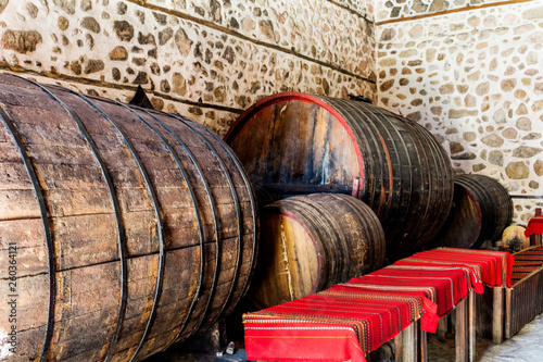 Traditional Wine Cellar with Huge Wine Barrels in the Historic City of Melnik  Bulgaria. 