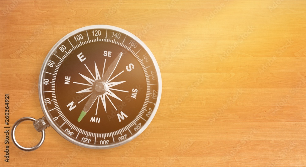 Metal antique compass on white background Metal antique compass on white background