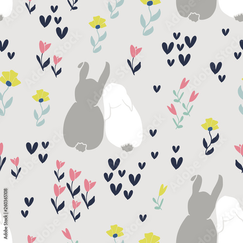Cute rabbits and flowers seamless pattern. Spring and easter theme seamless background for nursery, baby and kids products, fabric, stationery, textile