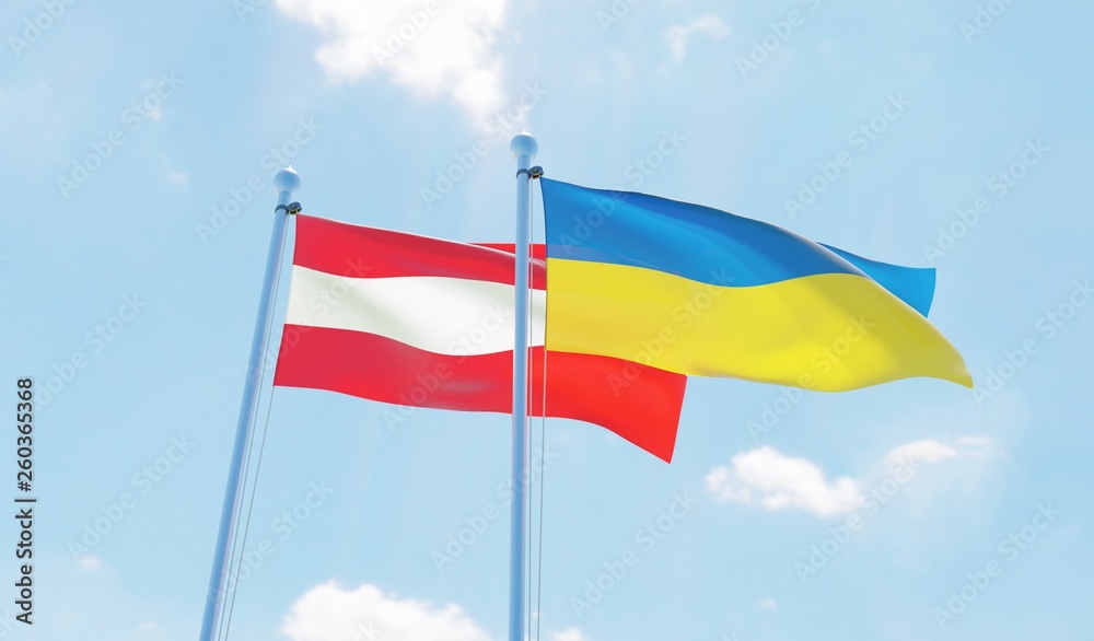 Austria and Ukraine, two flags waving against blue sky. 3d image Austria and Ukraine, two flags waving against blue sky. 3d image