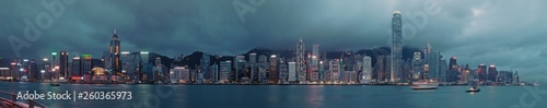Panorama of Hong Kong City skyline at night at taipan at typhoon . View from across Victoria Harbor HongKong