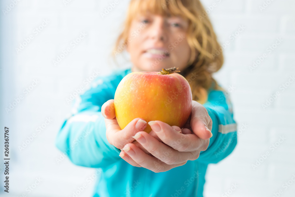 woman athlete with apple, diet and sport woman athlete with apple, diet and sport