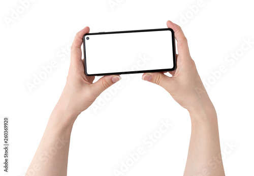 Smartphone with a blank white screen. New popular smartphone in hands on white background.