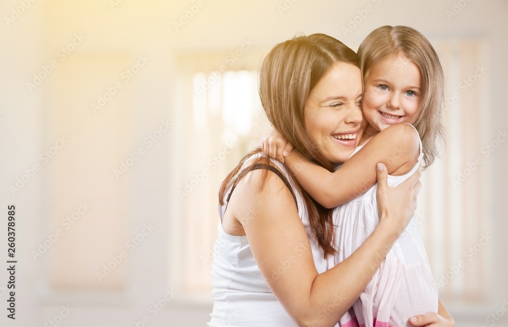 Happy Mother and daughter hugging Happy Mother and daughter hugging