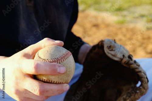 Baseball player with ball in hand for sport game closeup.