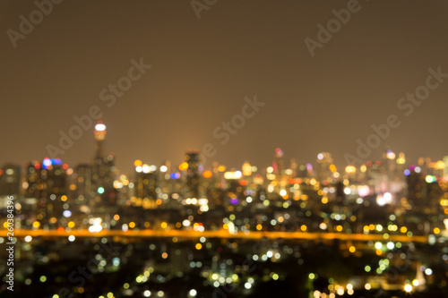 Defocused Image Of Illuminated City At Night
