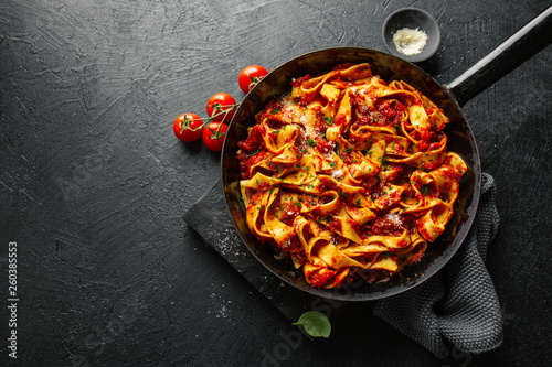 Italian spaghetti with tomato sauce in pan