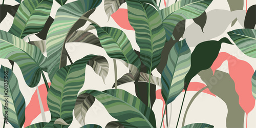 Summer seamless pattern. Green and pink leaves of palm trees and tropical plants on a light background. Vector illustration 