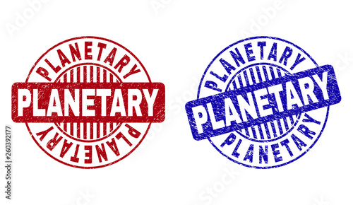 Grunge PLANETARY round stamp seals isolated on a white background. Round seals with grunge texture in red and blue colors. Vector rubber overlay of PLANETARY text inside circle form with stripes.