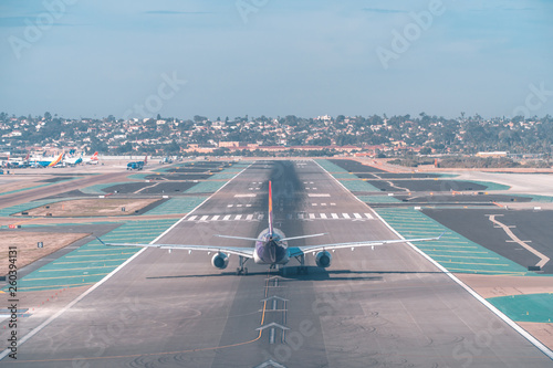 San Diego, USA, 2018. Airplane in airport on runway ready to take off. Airlines, self motivation, personal growth concept