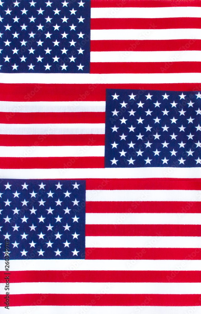 Naklejka premium Background wallpaper-3 small American flags overlapping each other in a vertical row