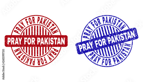 Grunge PRAY FOR PAKISTAN round stamp seals isolated on a white background. Round seals with grunge texture in red and blue colors.