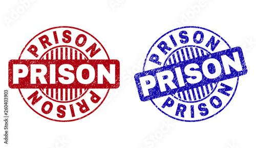 Grunge PRISON round stamp seals isolated on a white background. Round seals with grunge texture in red and blue colors. Vector rubber imprint of PRISON text inside circle form with stripes.