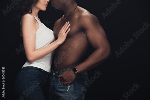 cropped view of shirtless african american man and woman isolated on black