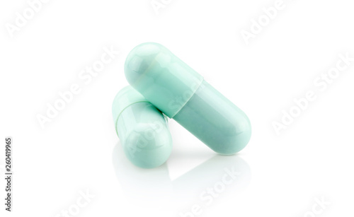 blue medicine capsules isolated on white background