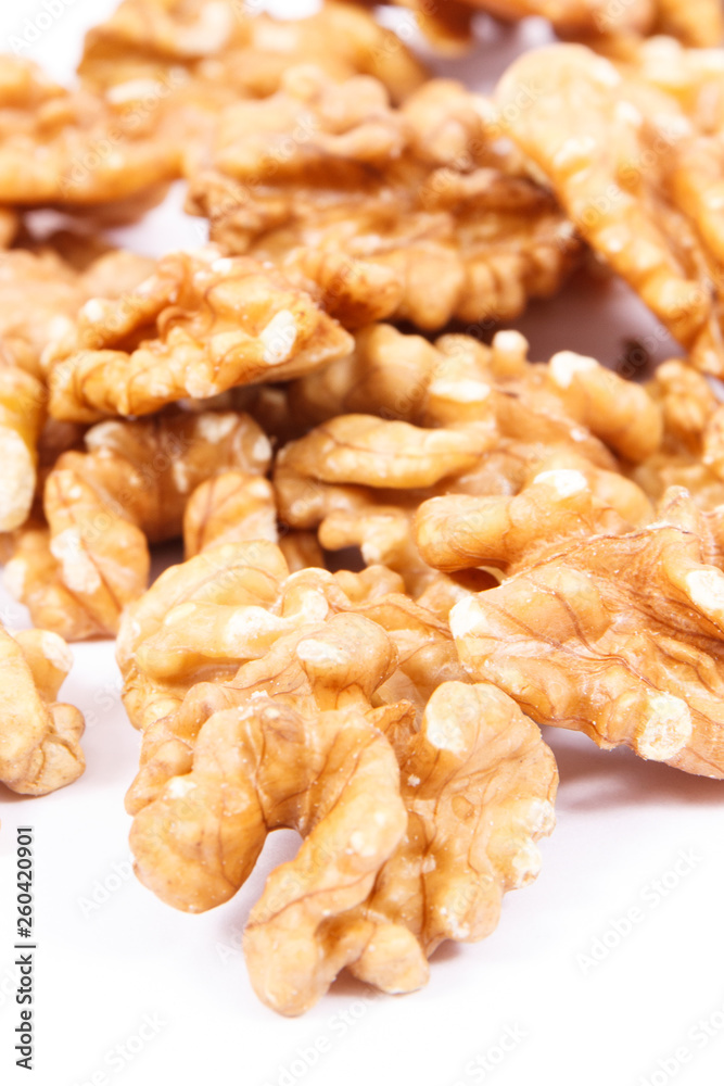 Healthy walnuts containing iron, omega 3 acids, dietary fiber and minerals, nutritious eating Healthy walnuts containing iron, omega 3 acids, dietary fiber and minerals, nutritious eating