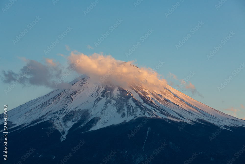 Amazing Mt Fuji Kawaguchiko lake, Japan landscape in sunset day time in blue sky background concept for fujisan japanese nature landmark, snow on top mountain scenery view, Winter cold  water city.