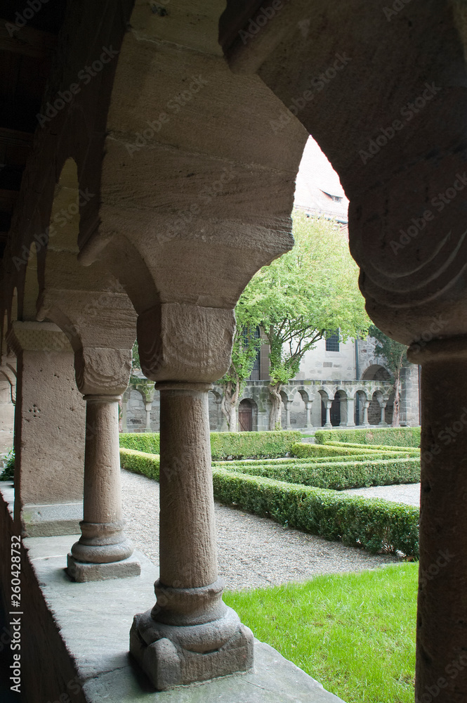 Feuchtwangen Germany, Romanesque cloister arches looking into courtyard courtyard