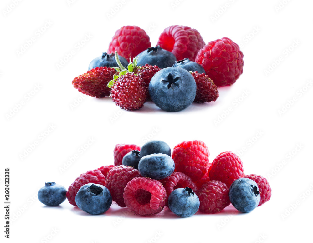 Ripe berries isolated on white background. Blueberries, wild strawberries and raspberries. Mix berries and fruits with copy space for text. Mix berries on white background. Pink and blue food. Ripe berries isolated on white background. Blueberries, wild strawberries and raspberries. Mix berries and fruits with copy space for text. Mix berries on white background. Pink and blue food.