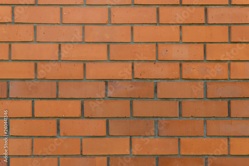 wall structure with rows of red brick masonry