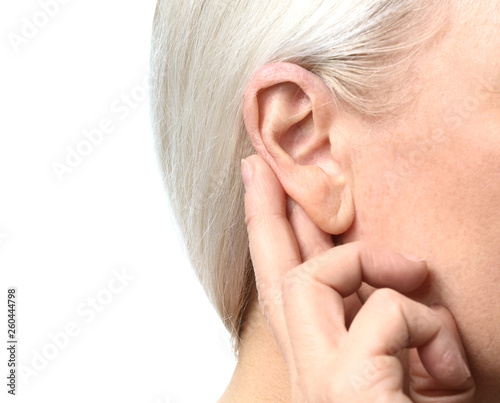 Mature woman with hearing p...