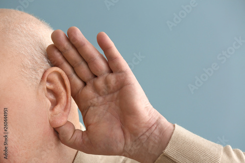 Senior man with hearing pro...