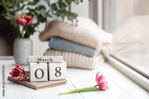Fototapeta Naklejka Na Ścianę i Meble -  Calendar with date of March 8 on window sill