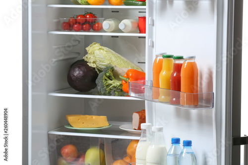 Wallpaper Mural Open fridge full of different food Torontodigital.ca