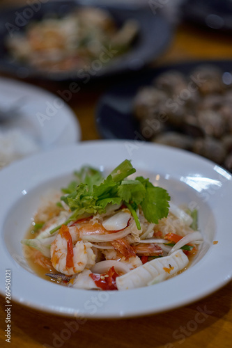 Spicy vermicelli salad in thailand restaurant Spicy seafood salad