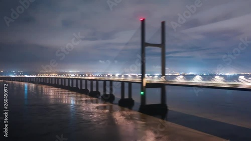 Wallpaper Mural Aerial night long exposure hyperlapse shot over the Severn River of the Prince of Wales Bridge M4 motorway, south east facing from Wales to England Torontodigital.ca