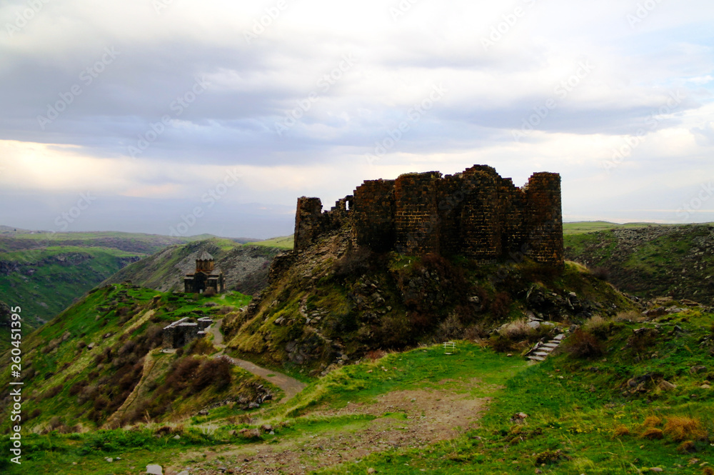Sunset view to Vahramashen Church and Amberd fortress in Armenia