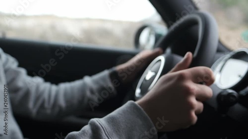man driving a car