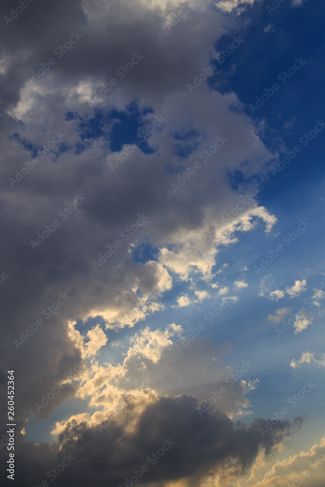 Clouds after rain before sunset as a background