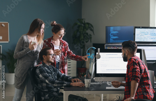 Team of programmers working...