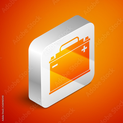 Isometric Car battery icon isolated on orange background. Accumulator battery energy power and electricity accumulator battery. Silver square button. Vector Illustration