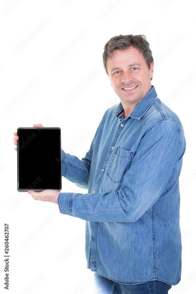 Smiling man middle aged showing blank tablet computer black screen