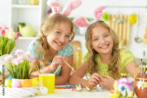 Portrait of sisters preparing for Easter in the kitchen