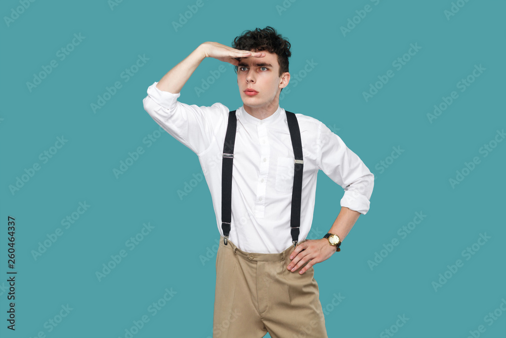 Attentive man looking to far with hand on forrhead. Attentive man looking to far with hand on forrhead.