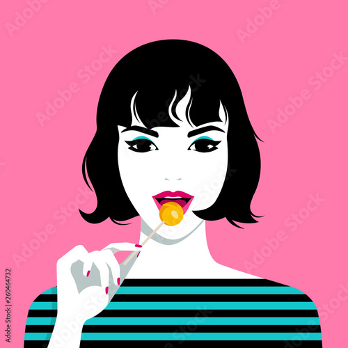 Woman eating lollipop