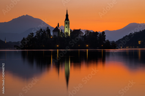 Sunrise on Bled Lake with Pilgrimage Church, Bled, Slovenia, Europe.