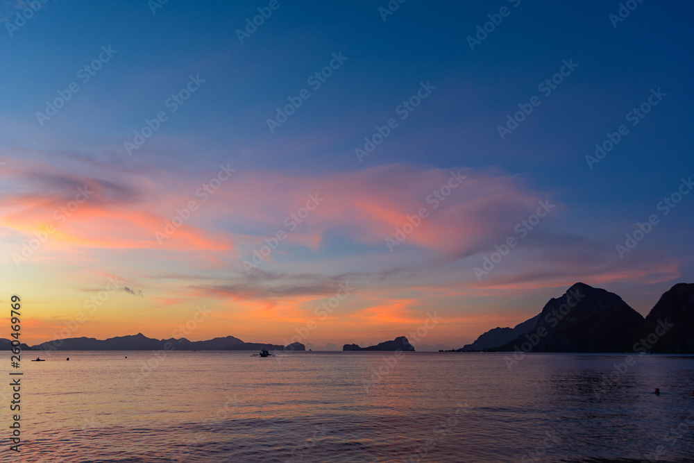 El Nido Palawan, Philippines. Tropical sunset in the sea. Cloudy landscape in the sea.	