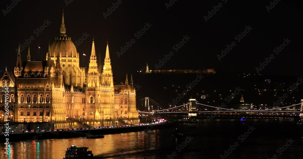 A view of Hungarian Parliament building and Danube river at night A view of Hungarian Parliament building and Danube river at night