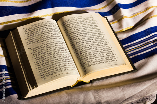Hebrew Bible and a tallit, a jewish prayer shawl