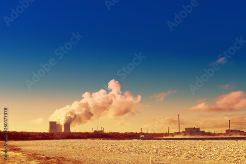 cooling towers emit steam at a nuclear power plant located on the shore of the Bay.Cooling of nuclear reactor