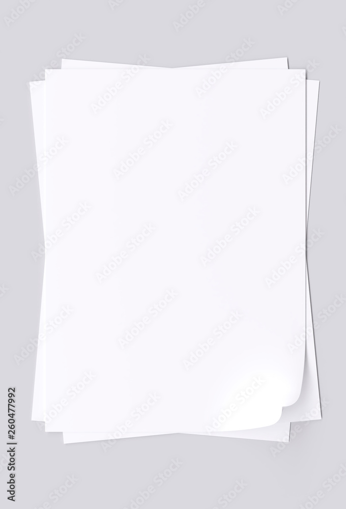 Blank sheets of white paper isolated on gray background. 3d image