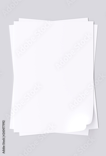 Blank sheets of white paper isolated on gray background. 3d image