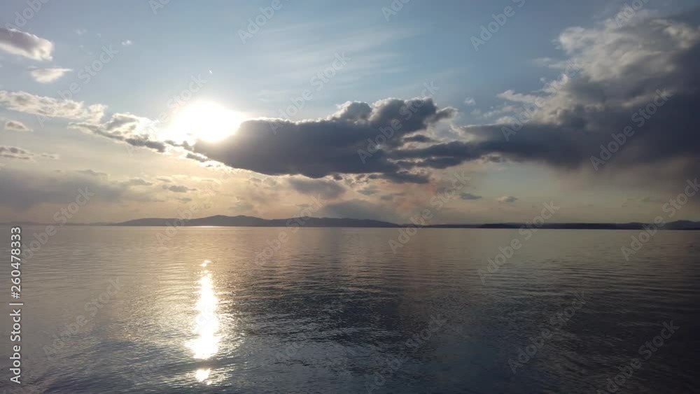 Seascape with calm mirror sea reflecting the sky. Seascape with calm mirror sea reflecting the sky.